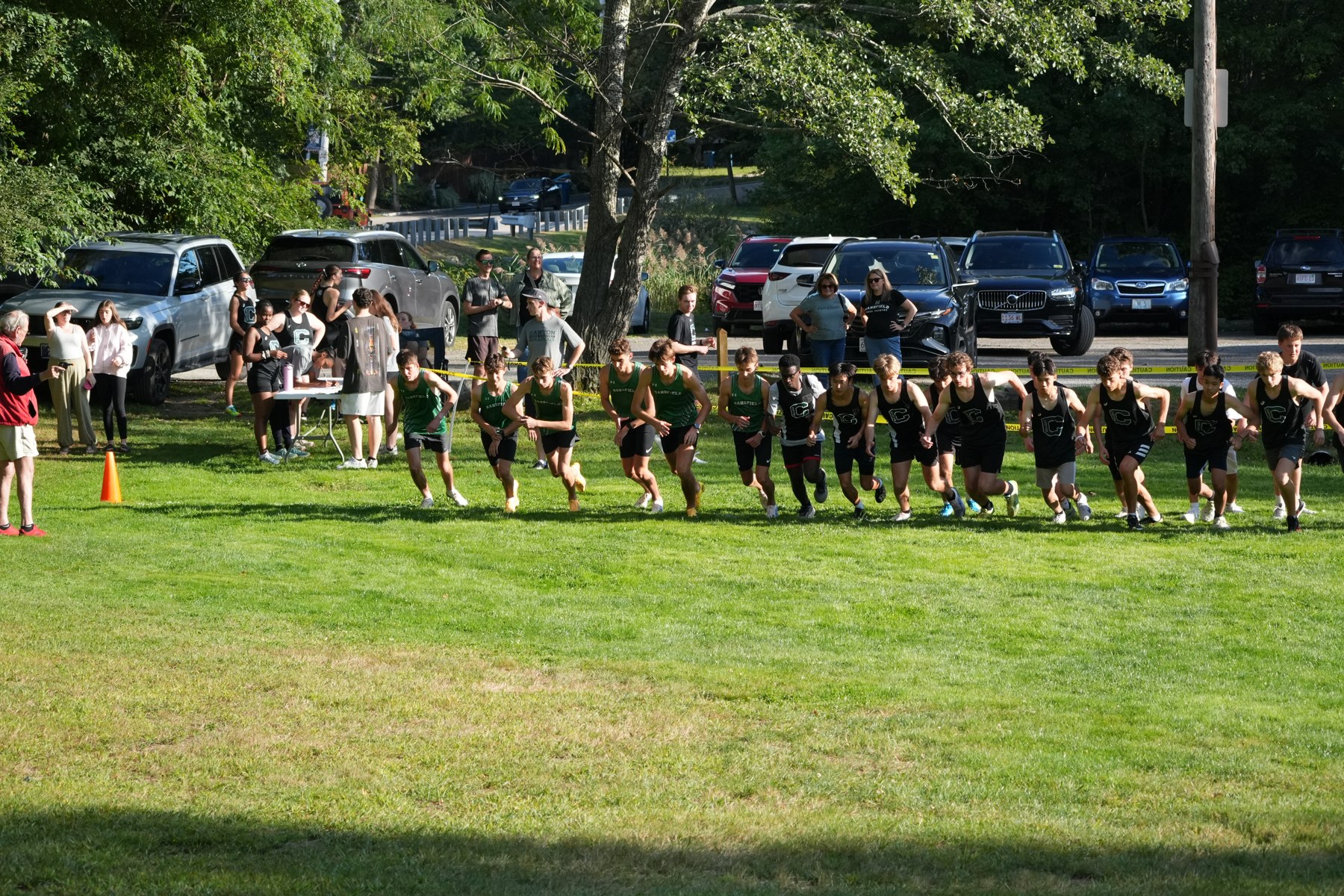 Mansfield and Canton runners leaving the starting line.